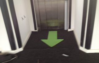 green arrow on carpet