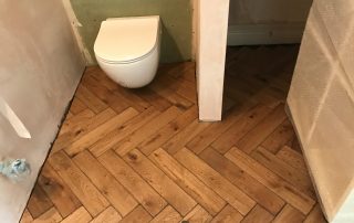 brown karndean flooring bathroom